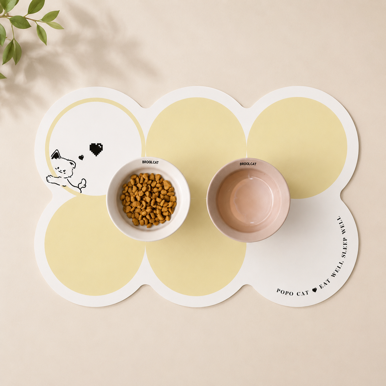Pet Feeding Mat in yellow and white with a food and water bowl sitting on it