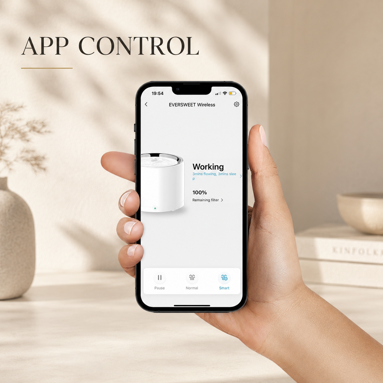 Hand holding phone showing Petkit Eversweet Wireless app