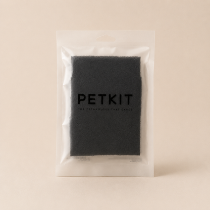 Packet of filters in a PETKIT branded clear plastic packaging on a beige background