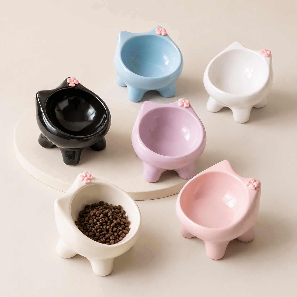 Ceramic Elevated Cat Bowl shaped like a cat with a bow, in various colours 