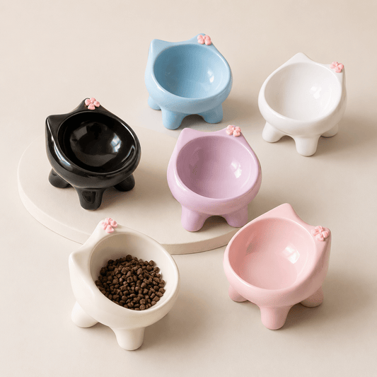 Ceramic Elevated Cat Bowl shaped like a cat with a bow, in various colours 