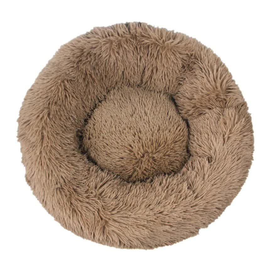Fluffy brown pet bed on a white background
