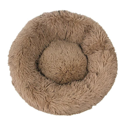 Fluffy brown pet bed on a white background