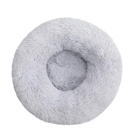 Fluffy gray donut pet bed on a white background