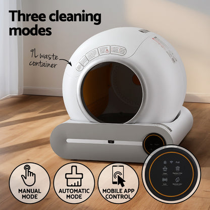 White pet litter box with cleaning mode features on a wooden floor