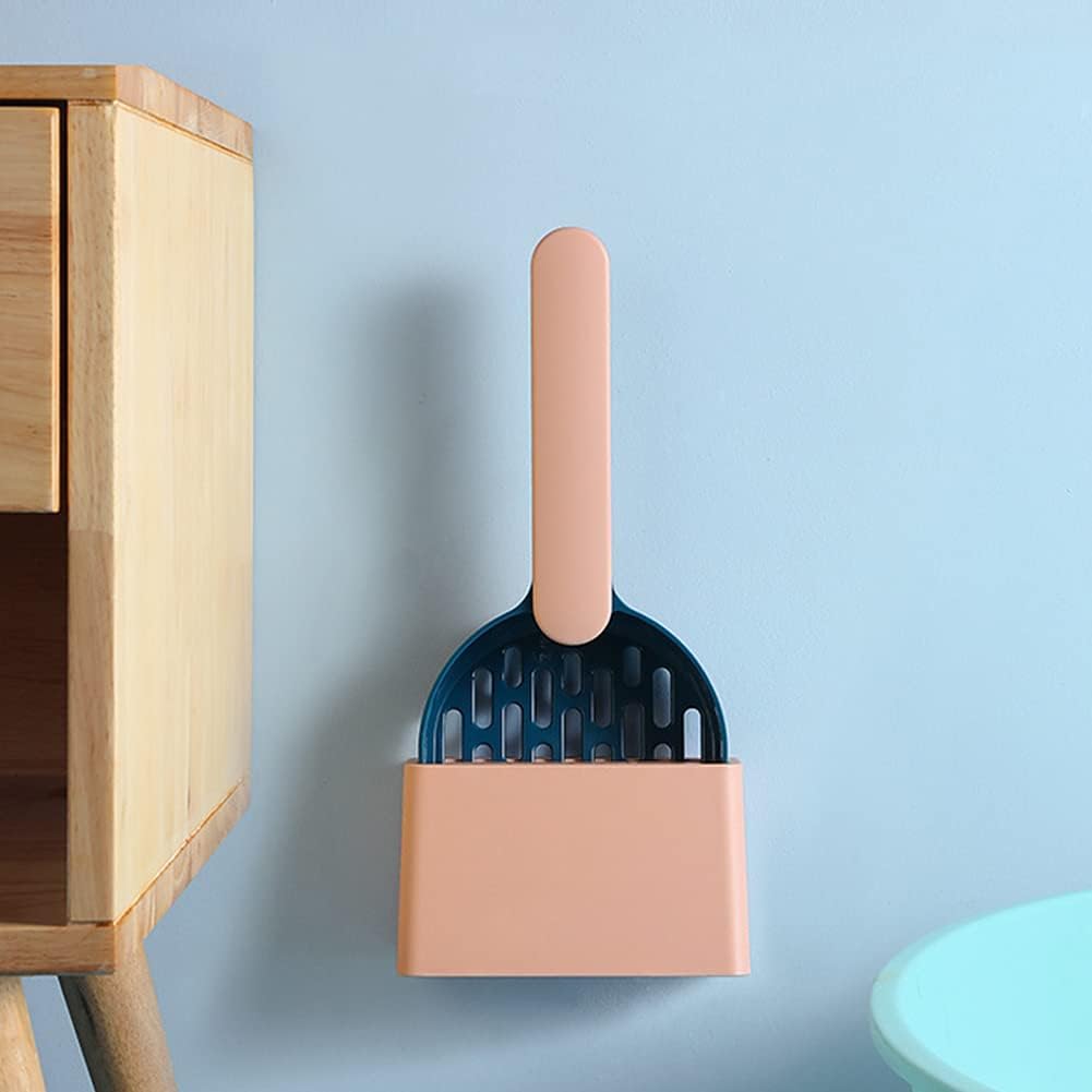 Dark blue pet litter scoop with beige handle in a beige holder against a light blue background
