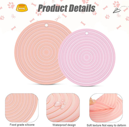 Two pink silicone pet feeding mats with product details on a white background