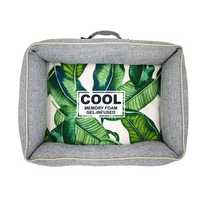 Gray pet bed with a green leaf pattern and 'Cool' label on a white background