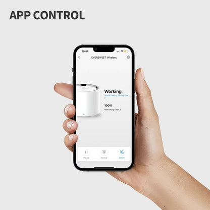 Hand holding a smartphone with app control interface on a white background
