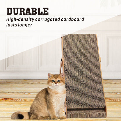 Cat sitting next to a cat scratcher with text about durability - high density corrugated cardboard lasts longer.