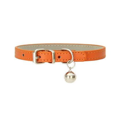 Orange leather cat collar with a silver bell on a white background