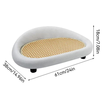 Grey pet bed with a scratching mat, shown with dimensions on a white background