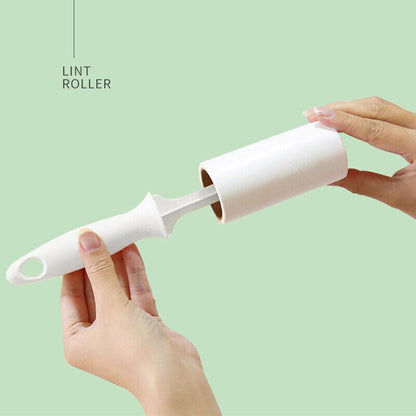 White lint roller with a person using it on a light green background