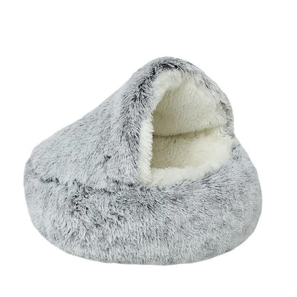 Fluffy gray pet bed nest with a white interior on a white background