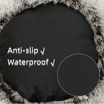 Bottom of pet bed with anti-slip and waterproof text on a textured surface