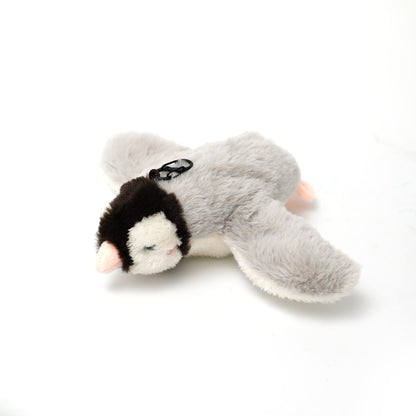 Plush toy resembling a penguin on a white background