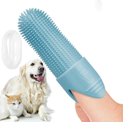 Blue pet finger toothbrush held by a hand with a dog and cat in the background.