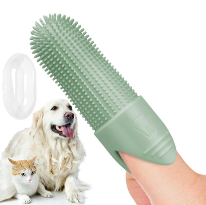 Green pet toothbrush on a finger with a dog and cat in the background.