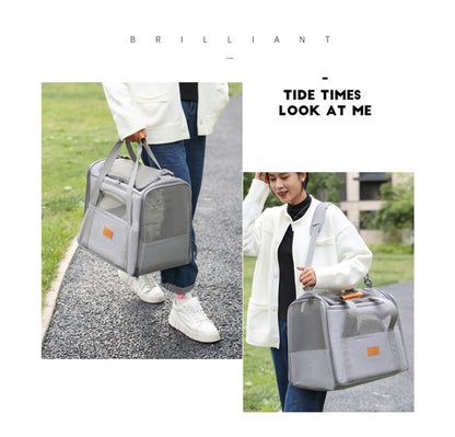 Person holding a grey soft cart carrier with 'Brilliant' and 'Tide Times Look at Me' text.