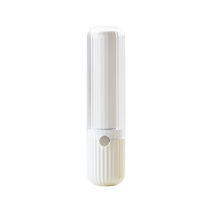 White handheld lint roller on a white background