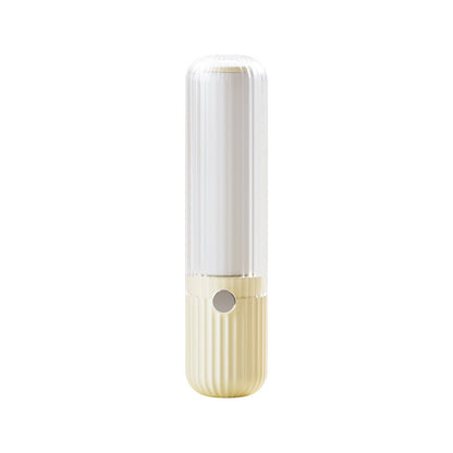 White and yellow lint roller on a white background