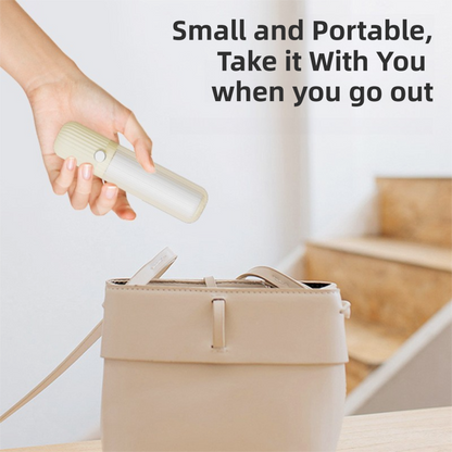 Hand holding a small lint roller with text 'Small and Portable, Take it With You when you go out' above a beige bag.